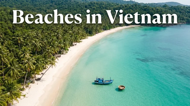 Aerial view of Sao Beach on Phu Quoc Island, Vietnam, with white sand, turquoise water, and a traditional Vietnamese fishing boat.