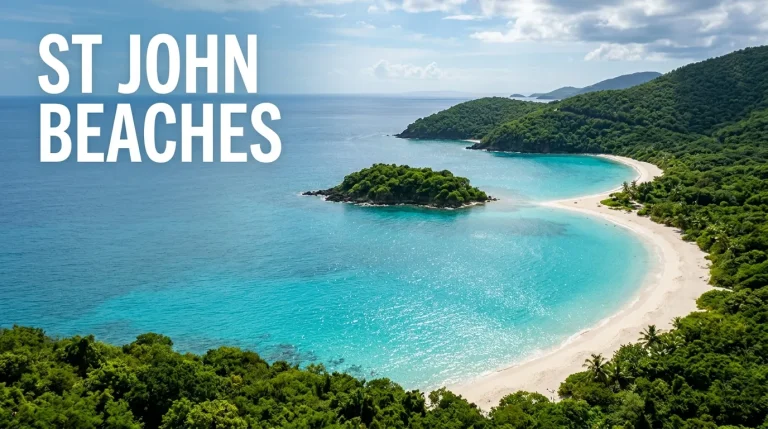 Aerial view of Trunk Bay on St. John showing the white sand beach, turquoise water, and Trunk Cay, one of the best St. John beaches in the USVI.